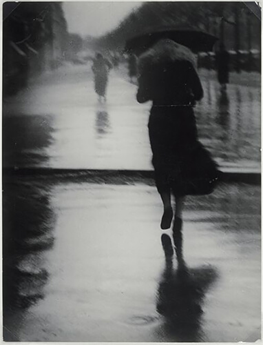 Passerby in the Rain, 1935<p>Courtesy Vintage Works, Ltd / © George Brassaï</p>