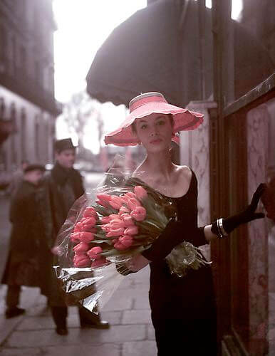 Suzy Parker with red tulips<p>© George Dambier</p>