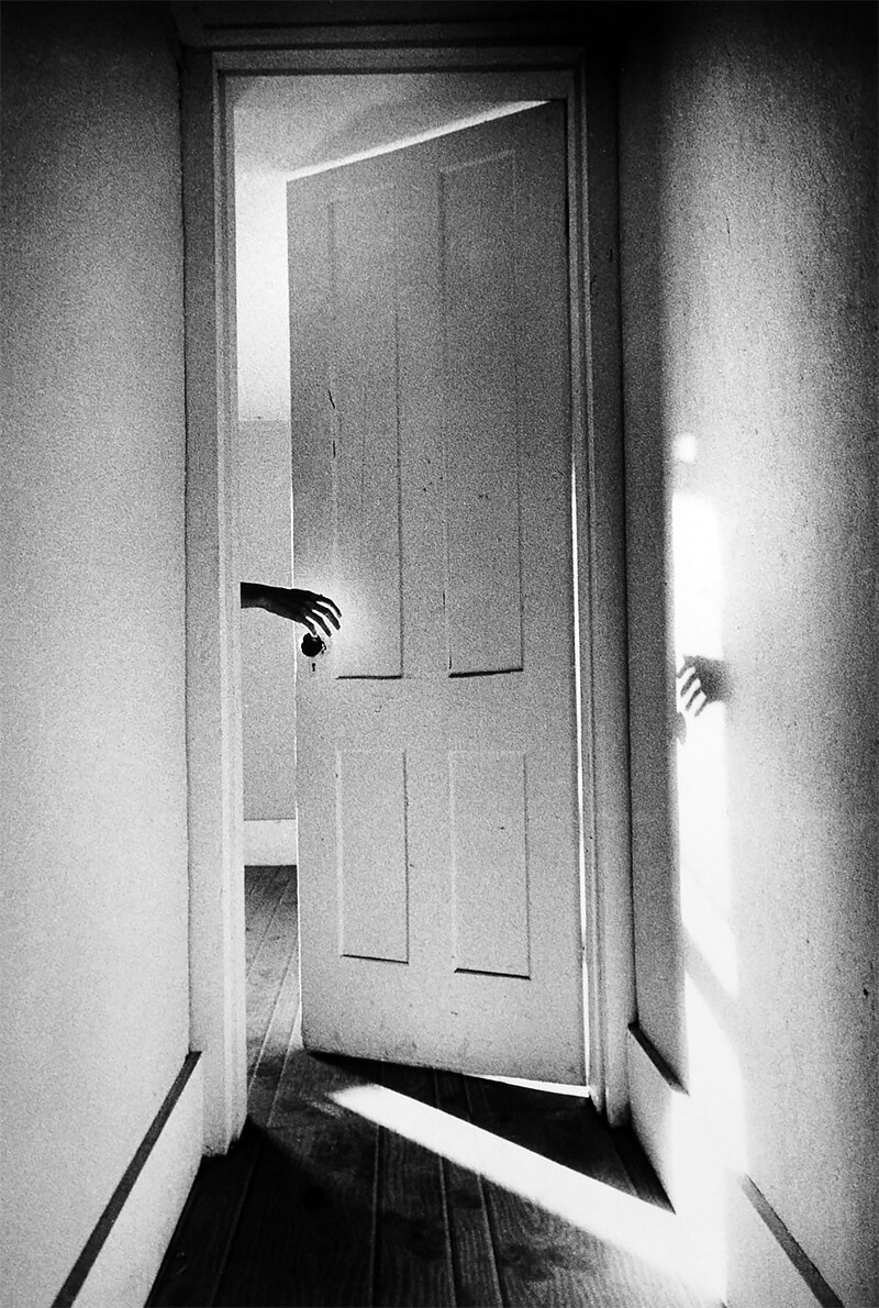 Hand on Door from the Som­nam­bu­list series 1968<p>© Ralph Gibson</p>