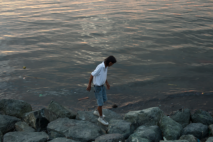 Jason Reblando - Man on Rocks, Manila Bay