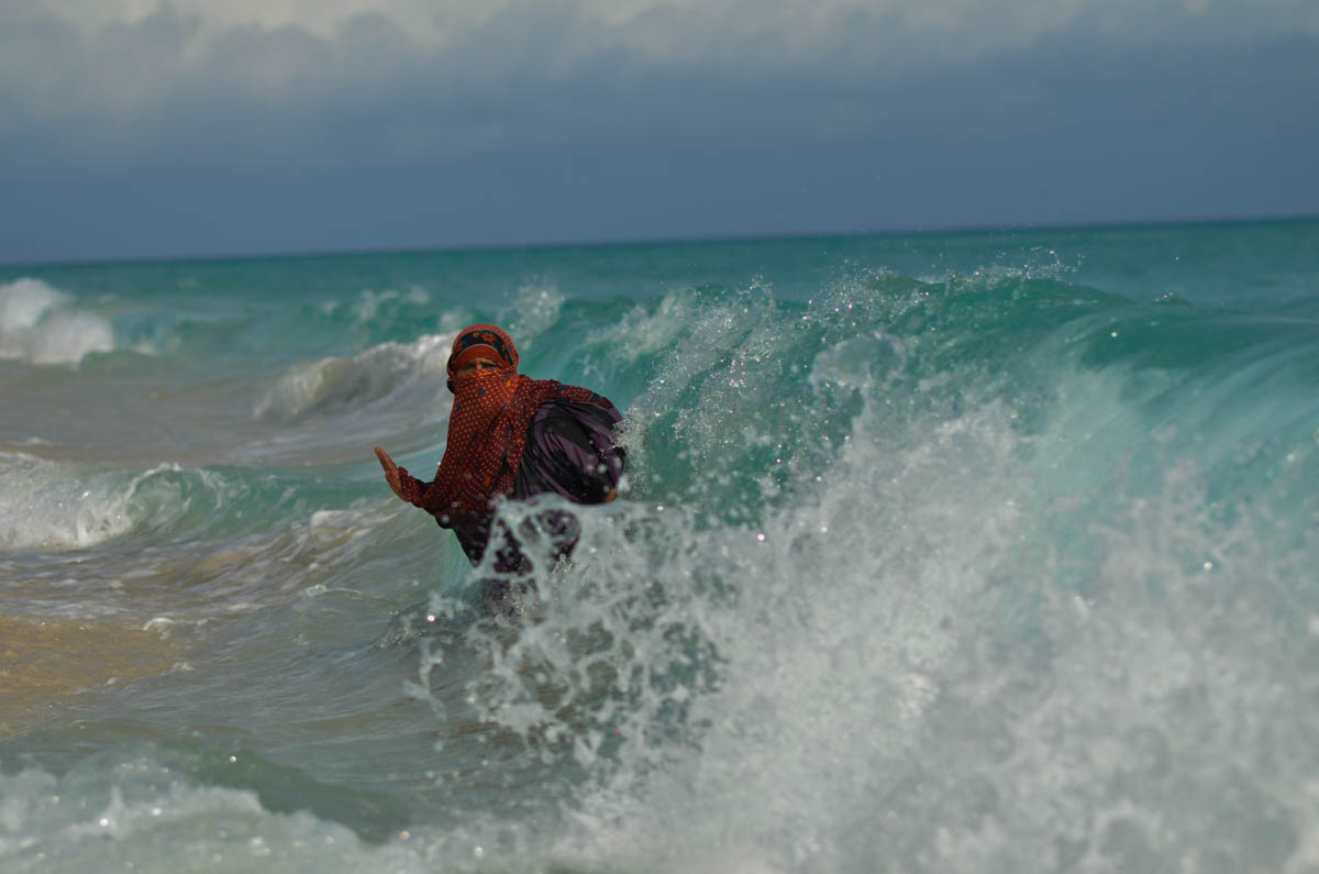 Detwah Lagoon, Socotra, Yemen on the 19th of May 2014. By middle of the day, Sadiya washes herself in Arabian Sea. <p>© Amira Al-Sharif</p>