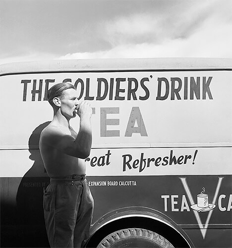 India 1944: A soldier drinking a cup of tea © IWM Non Commercial Licence<p>© Cecil Beaton</p>