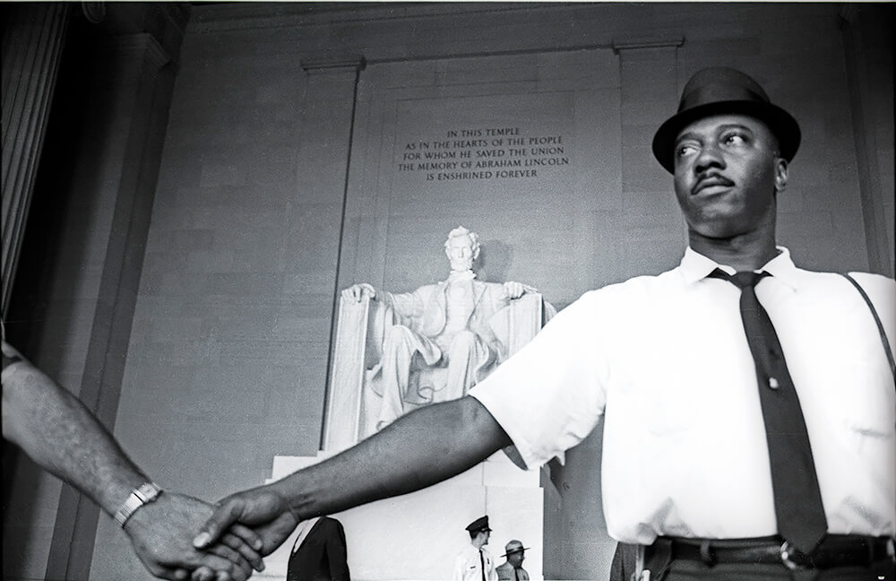 Monitors protecting the March on Washington leaders. August 28, 1963<p>© Dan Budnik</p>