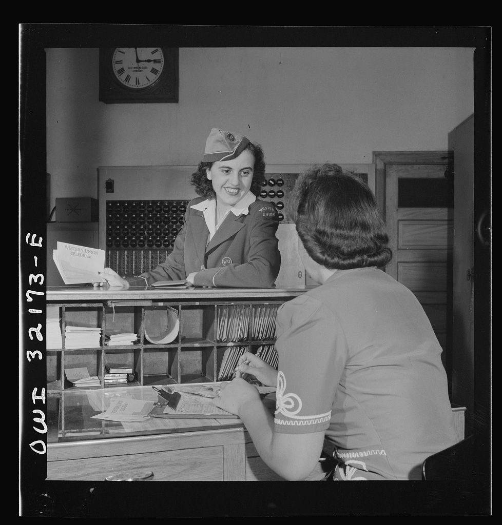  Washington, D.C. Miss Dorothy Lutz, a Western Union telegraph messenger, getting a sheaf of telegrams to deliver, June 1943 - Library of Congress<p>© Esther Bubley</p>