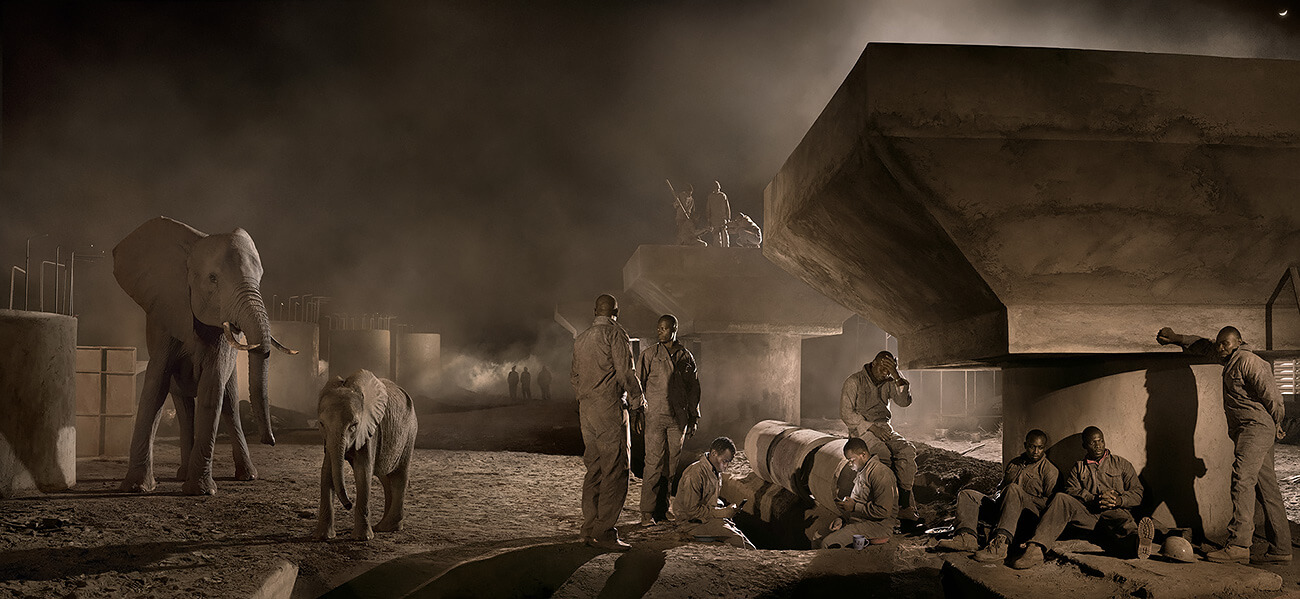 This Empty World - Bridge Construction with Elephants and Workers at Night<p>© Nick Brandt</p>