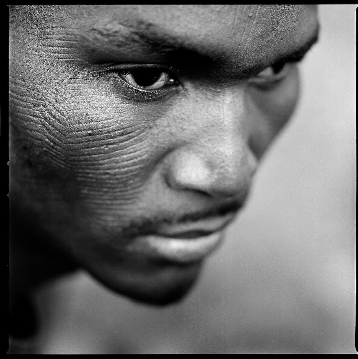 ”My friends asked me if it hurt and if I cried, and I said’no’,” explains Thomas from Natitingou. Benin 2009<p>Courtesy Redux Pictures / © Jean-Michel Clajot</p>