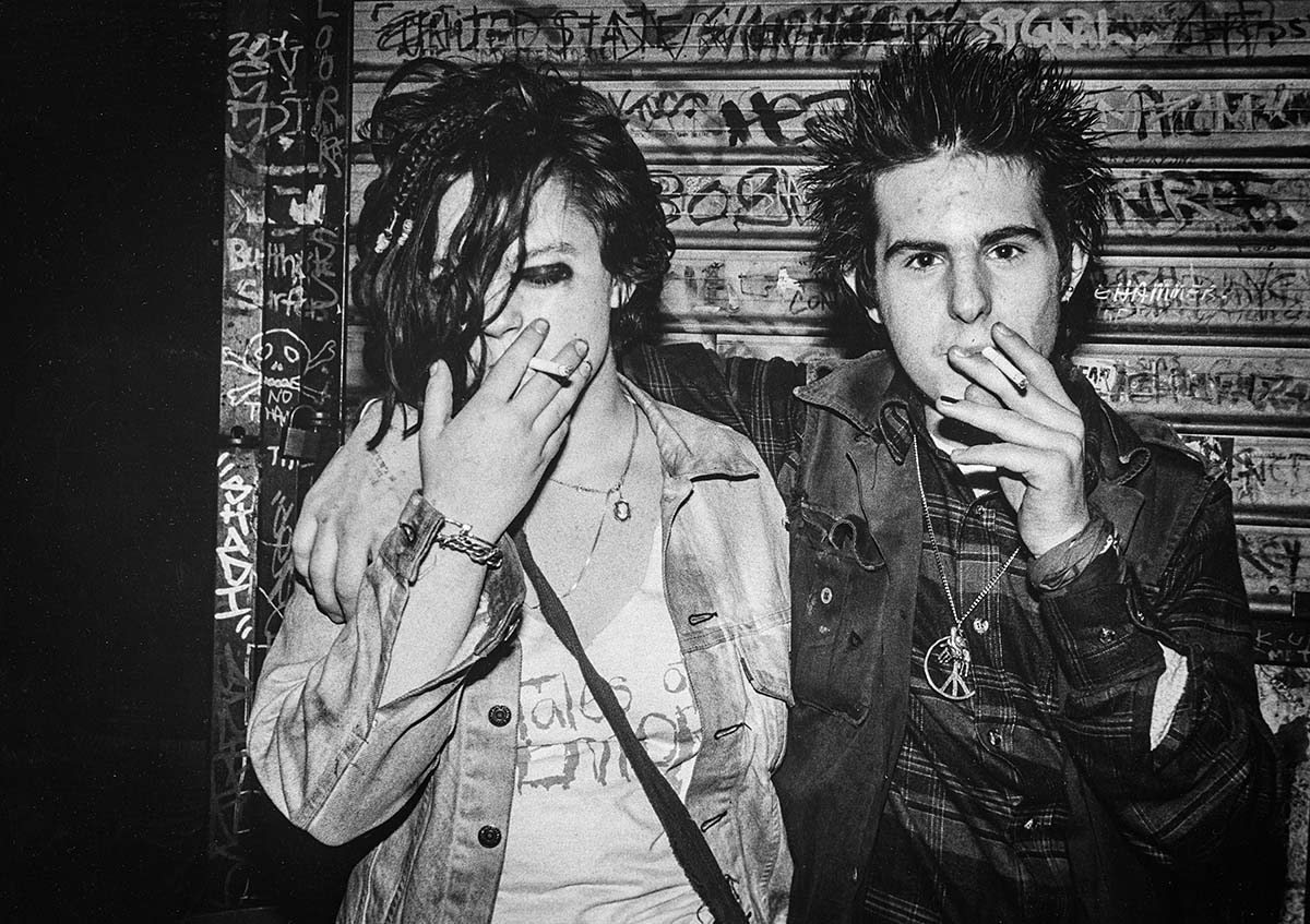 Couple Outside CBGB<p>© Lilian Caruana</p>