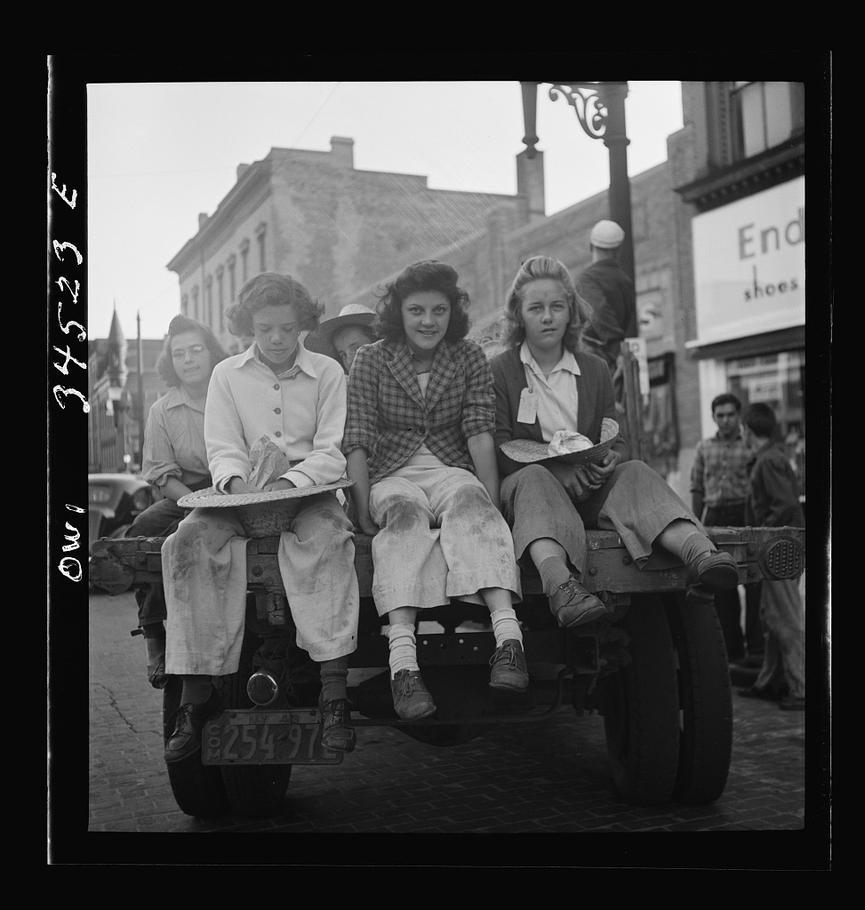 Oswego, New York. Children, recruited for farm work during the summer, waiting to start for work, June 1943 - Library of Congress<p>© Marjory Collins</p>