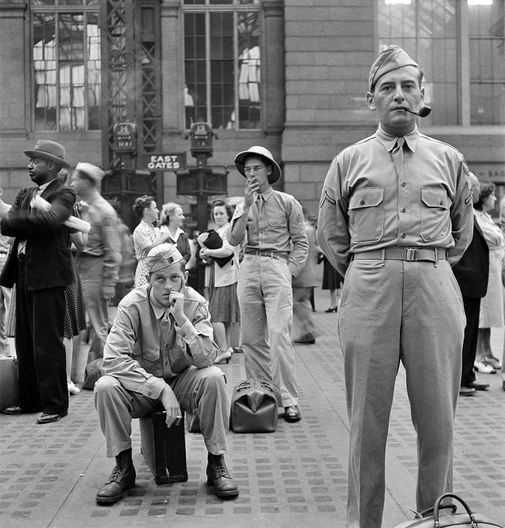 Loners in a Crowd- Waiting for trains at the Pennsylvania railroad station, in New York City, New York, August 1942 - Library of Congress<p>© Marjory Collins</p>