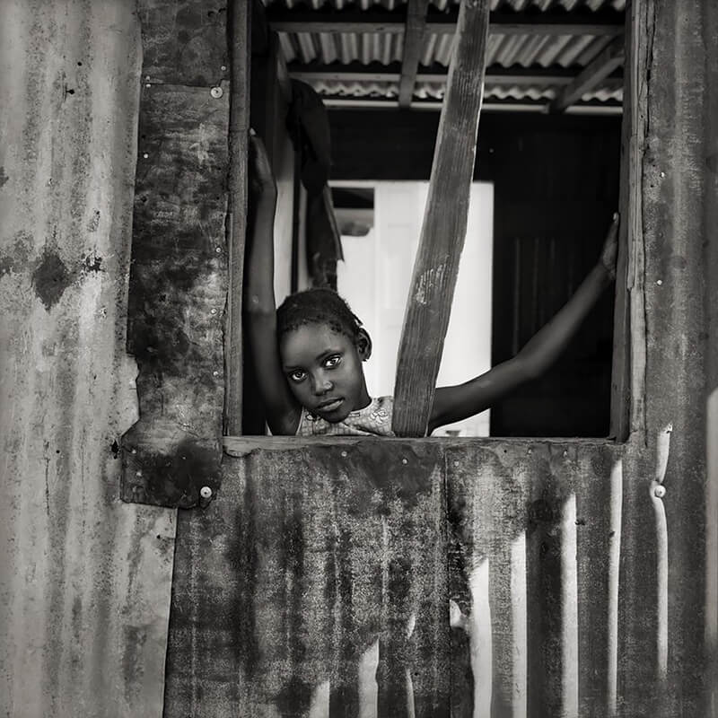 Bolans Girl in Tin House, Antigua WI<p>© Margo Davis</p>