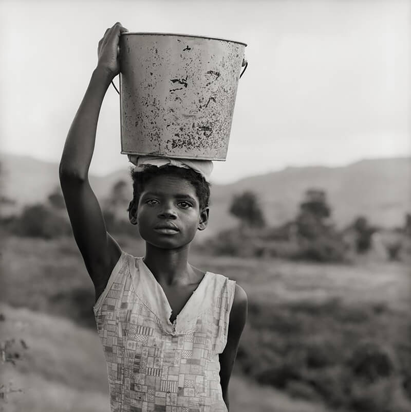 Bendal’s Girl with Bucket, Antigua WI<p>© Margo Davis</p>