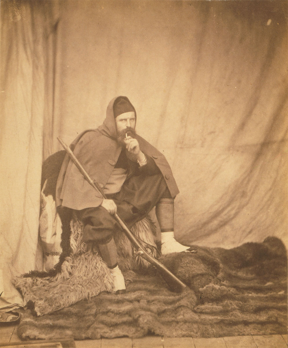 Roger Fenton, full-length portrait, dressed in a Zouave uniform, seated, facing front, holding rifle, 1855 - Library of Congress<p>© Roger Fenton</p>