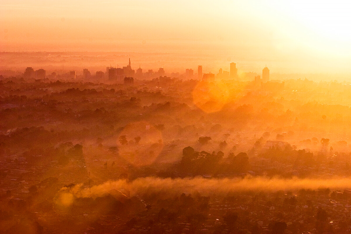 Aerial at sunrise over the city of Nairobi, Kenya, May 2006<p>© Georgina Goodwin</p>
