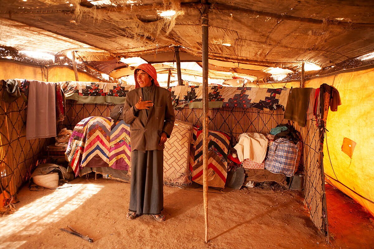 Silk Road: Boy in tent<p>© Lynn Gilbert</p>