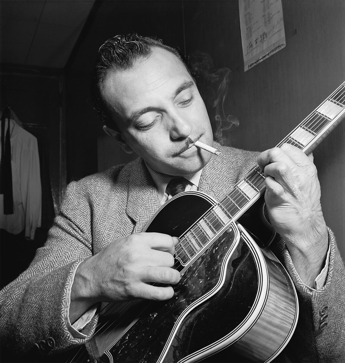 Django Reinhardt at the Aquarium jazz club in New York, NY, circa November 1946<p>© William Gottlieb</p>