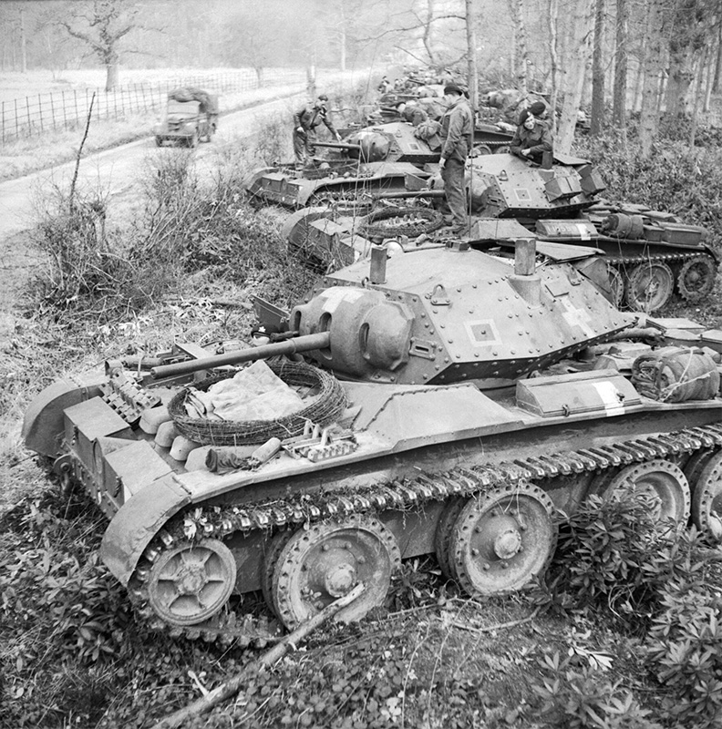Covenanter tanks harboured by the side of a road during Exercise ’Spartan’, 6 March 1943<p>© Bert Hardy</p>