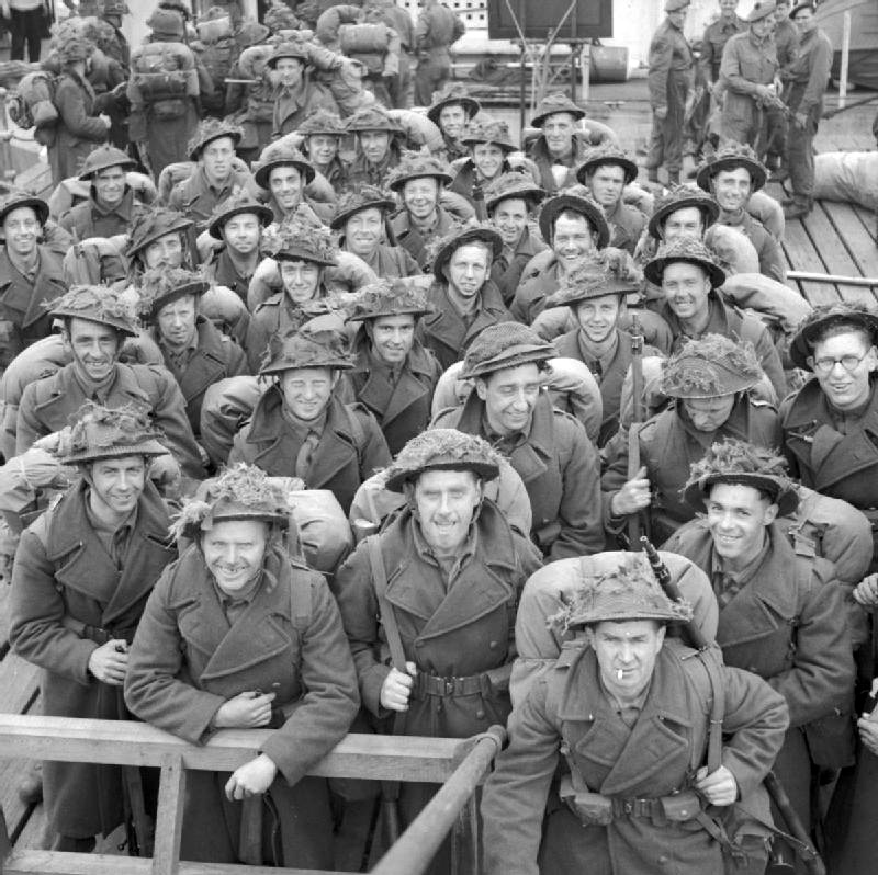 Royal Engineers embarking on a ship for Normandy, 9 June 1944<p>© Bert Hardy</p>