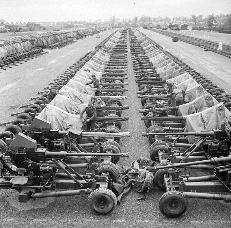 Preparations For Operation Overlord (the Normandy Landings)- D-day 6 June 1944 40mm. Bofors Light AA guns on Mark II mountings lined up at an Ordnance<p>© Bert Hardy</p>
