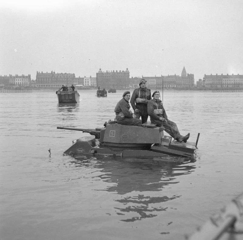 Humber armoured car immobilised in the sea at Weymouth during beach landing trials, 25 December 1943<p>© Bert Hardy</p>