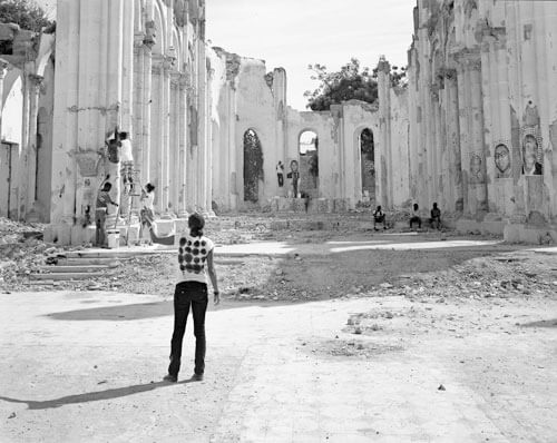 Volunteers installing JR’s “Rising Souls Haiti”, Cathédrale Notre-Dame de Port-au-Prince, January 2012<p>© Laura Heyman</p>
