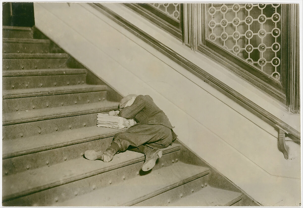 Newsboy asleep on stairs with papers, Jersey City, New Jersey MET 1912 © CCO<p>© Lewis Hine</p>