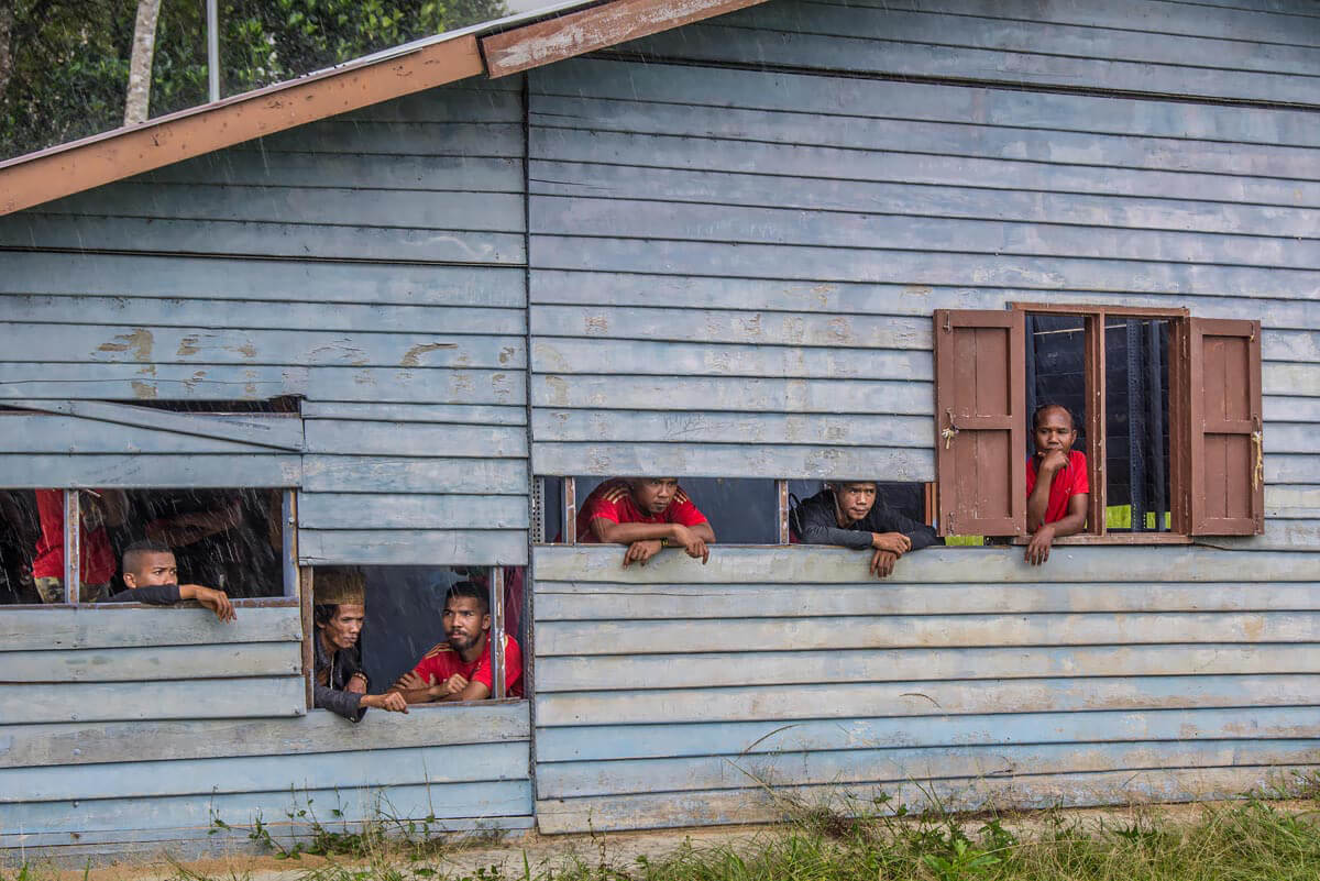 Temiar tribesmen take shelter in Malaysia’s rainforest<p>© Rod Harbinson</p>