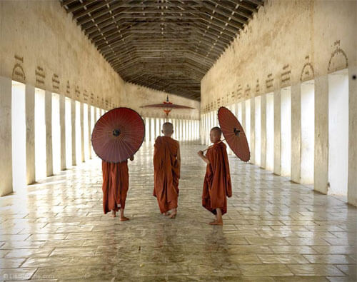 Three Parasols, Myanmar<p>© Lisa Kristine</p>