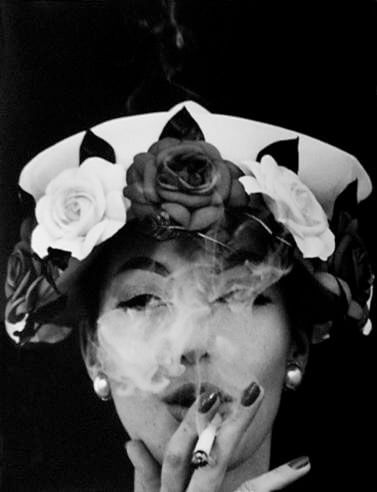 Hat and Five Roses, Paris, 1956<p>Courtesy Trunk Archive / © William Klein</p>