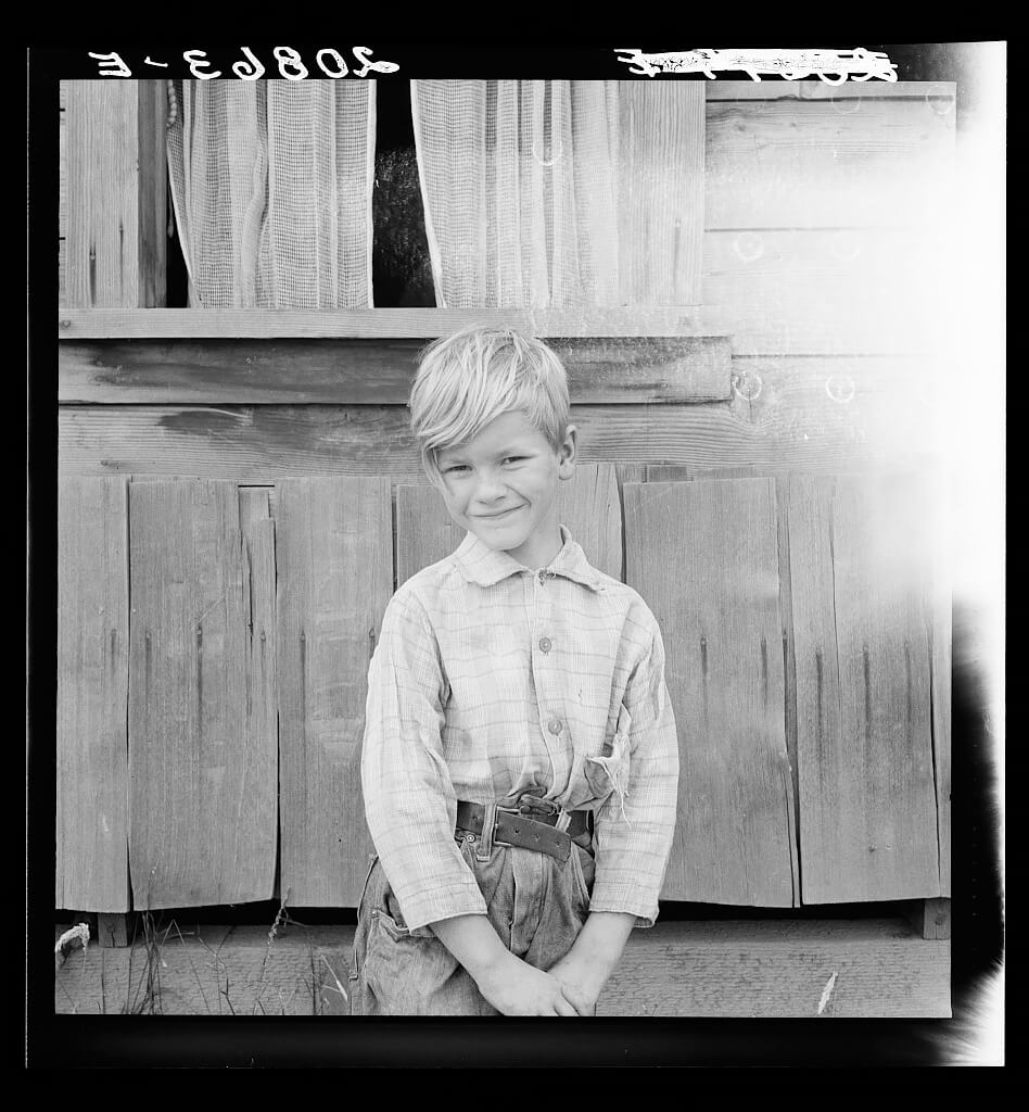 The youngest Arnold boy who also works at land clearing. Western Washington, 1939, FSA, Library of Congress<p>© Dorothea Lange</p>