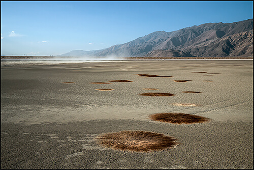 Small Dust Storm in Dry Shallow Flood Pond, Owens Lake, CA, 2013<p>© Jennifer Little</p>