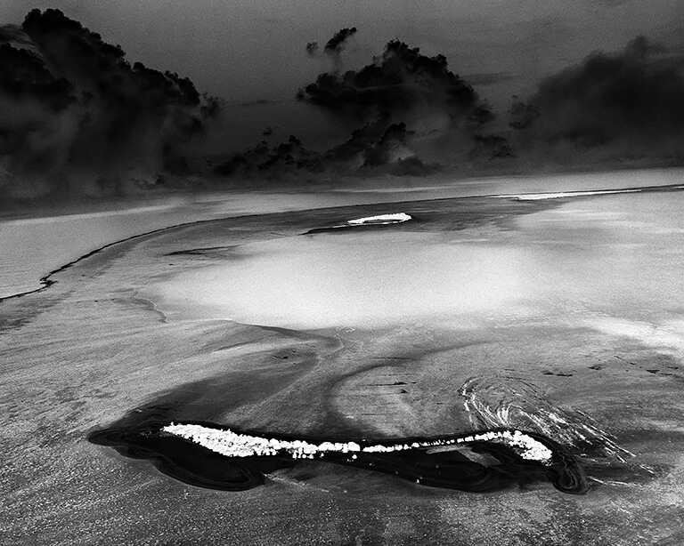 Mile Wide, 200 Foot Deep 1952 MIKE Crater, 10.4 Megatons, Enewetak Atoll, 2003<p>© Michael Light</p>