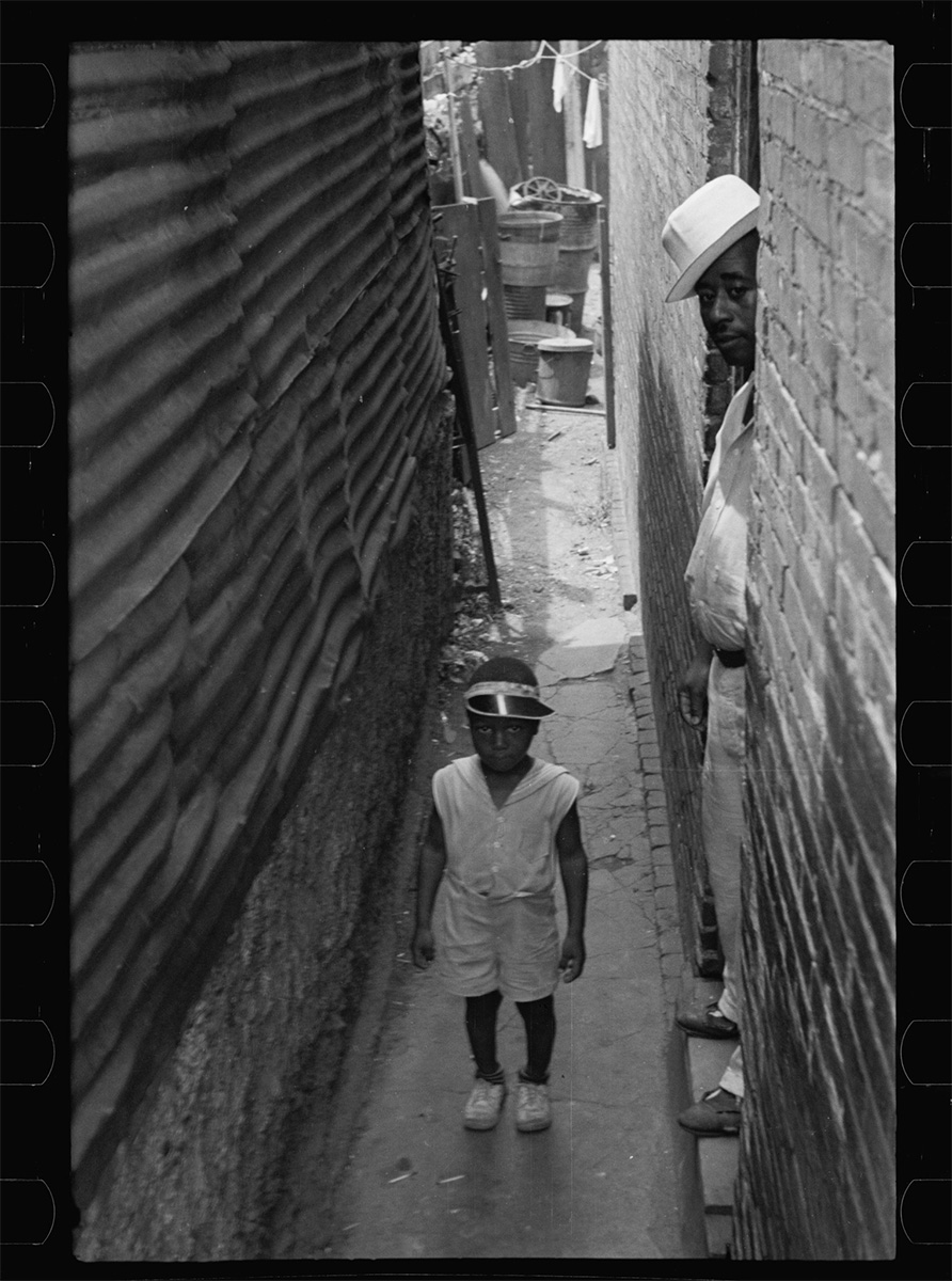 Untitled photo, child in alley, Houses close to Capitol, Washington, D.C., September 1935 - Library of Congress<p>© Carl Mydans</p>