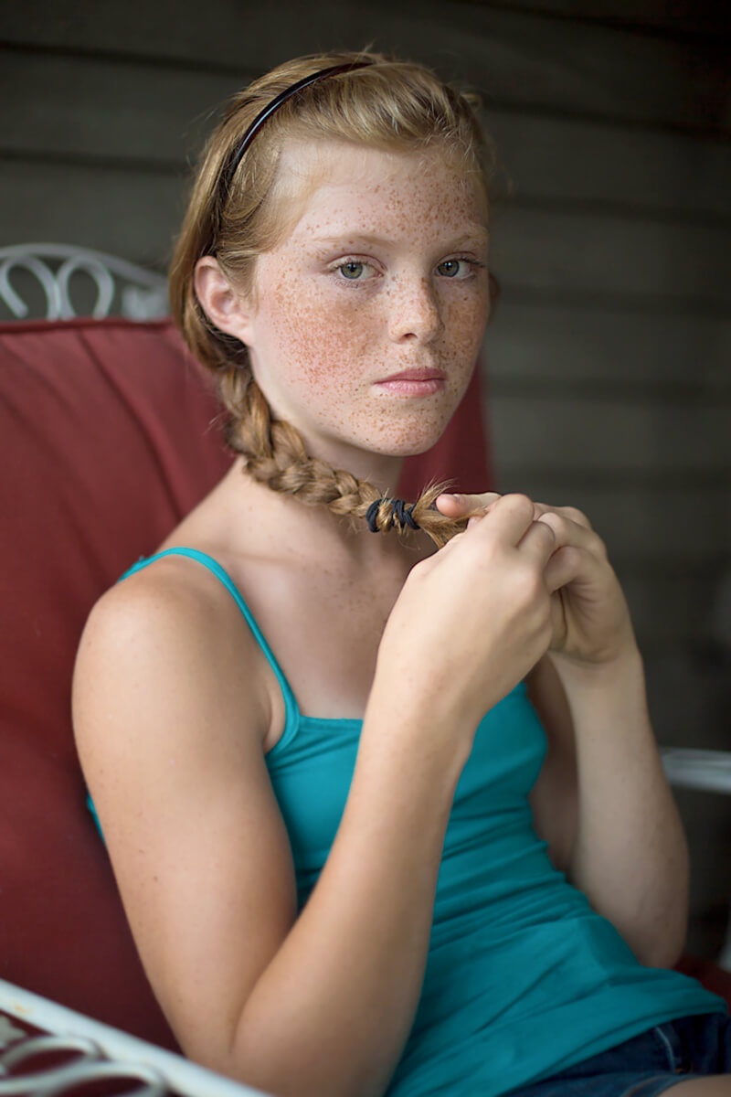 Eilidth holding her braid<p>© Jack Montgomery</p>