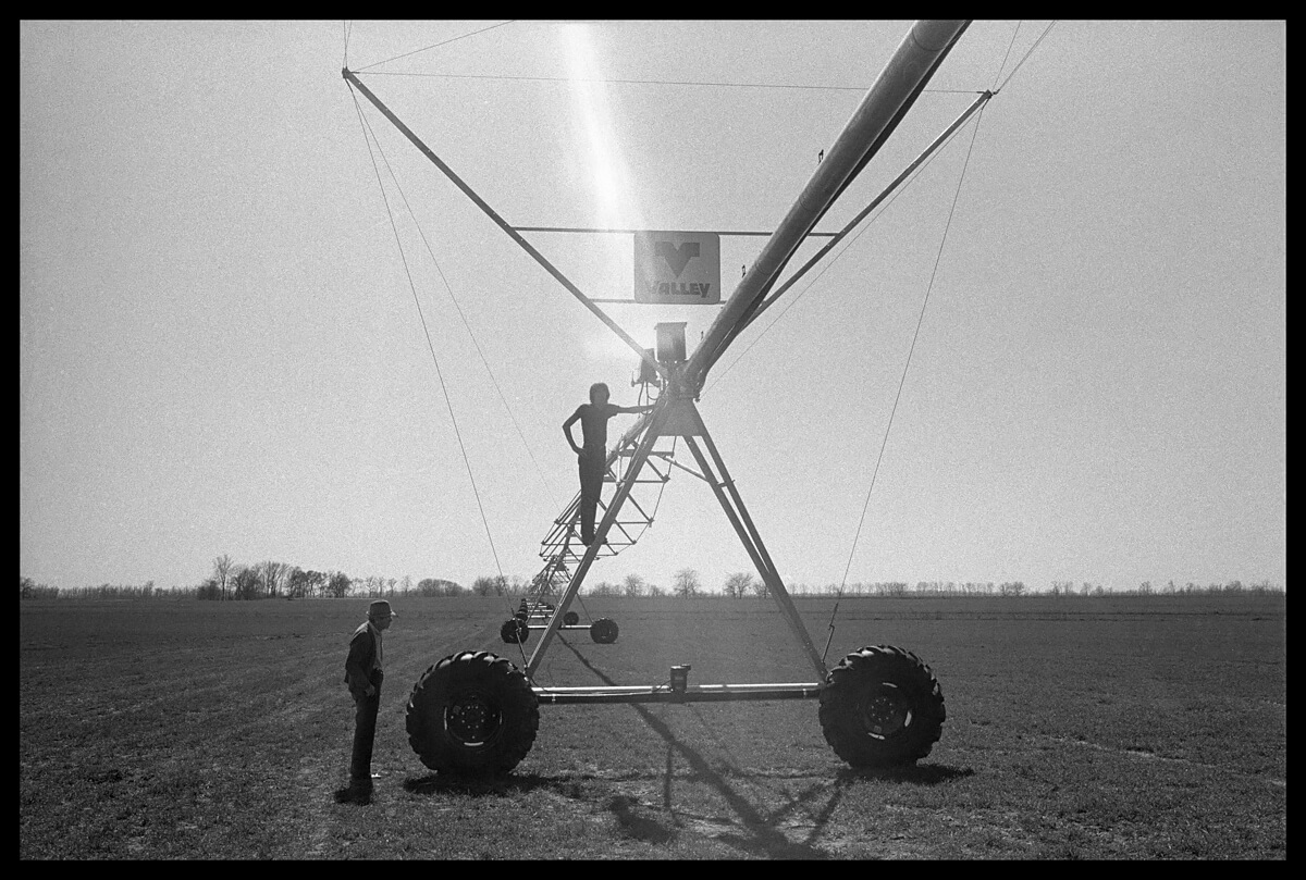 Granddaddy and Lind with Irrigation System<p>© Lisa McCord</p>