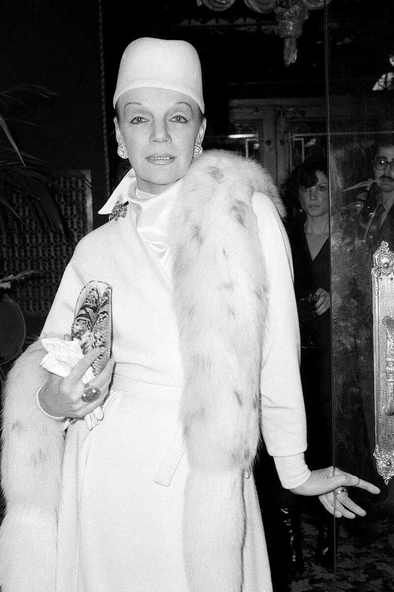 Woman Wearing White Outfit and Fur, Georgios, NY, NY, 1977<p>© Meryl Meisler</p>