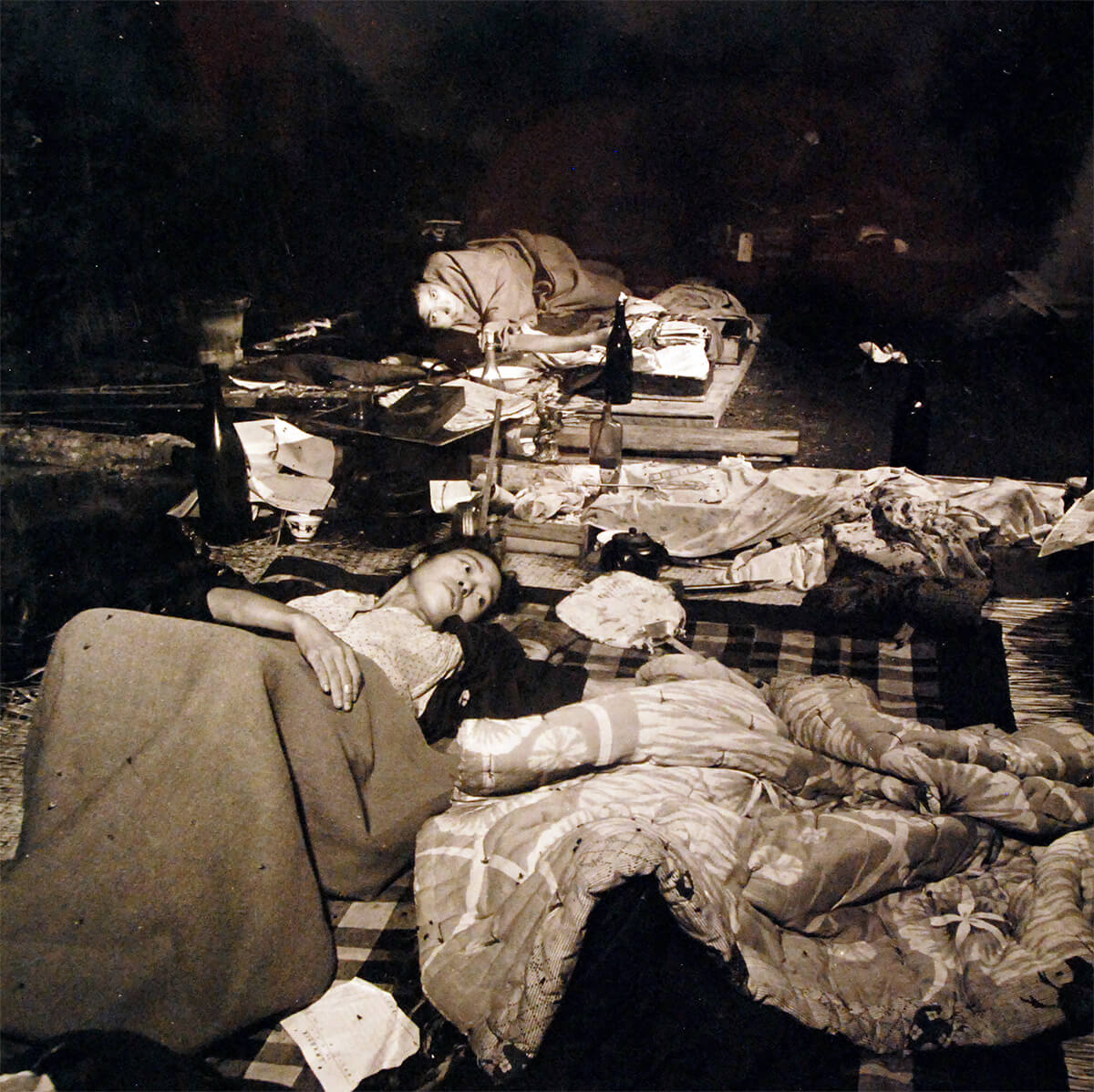 Japanese civilians in a refugee center inside a former bank, Hiroshima, Japan, Sep 1945,  National Museum of the United States Navy<p>© Wayne Miller</p>