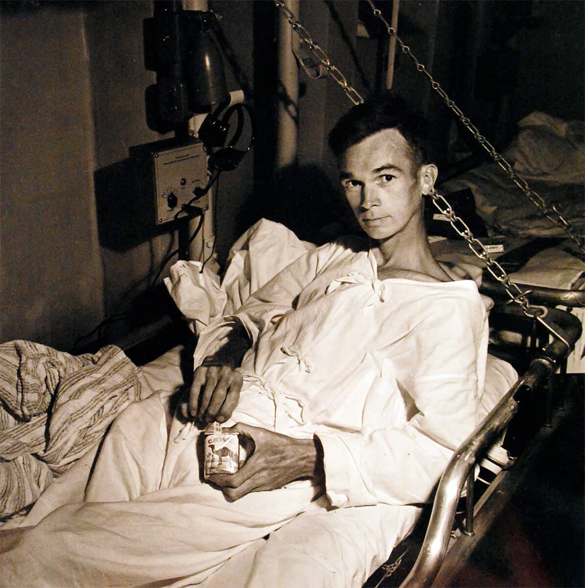 US Marine Corporal Leopold A. Kulikowski, former prisoner of war in Japan, aboard hospital ship USS Benevolence, Sep 1945, NMUSN<p>© Wayne Miller</p>