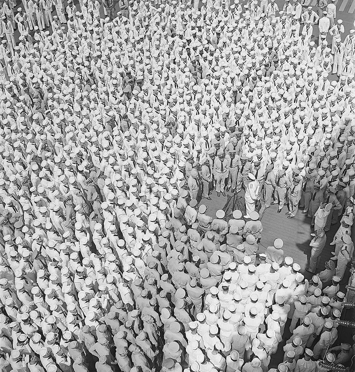 British Admiral Louis Mountbatten speaking to the officers and men of USS Saratoga at Colombo, Ceylon (now Sri Lanka), 30 Apr 1944, NMUSN<p>© Wayne Miller</p>