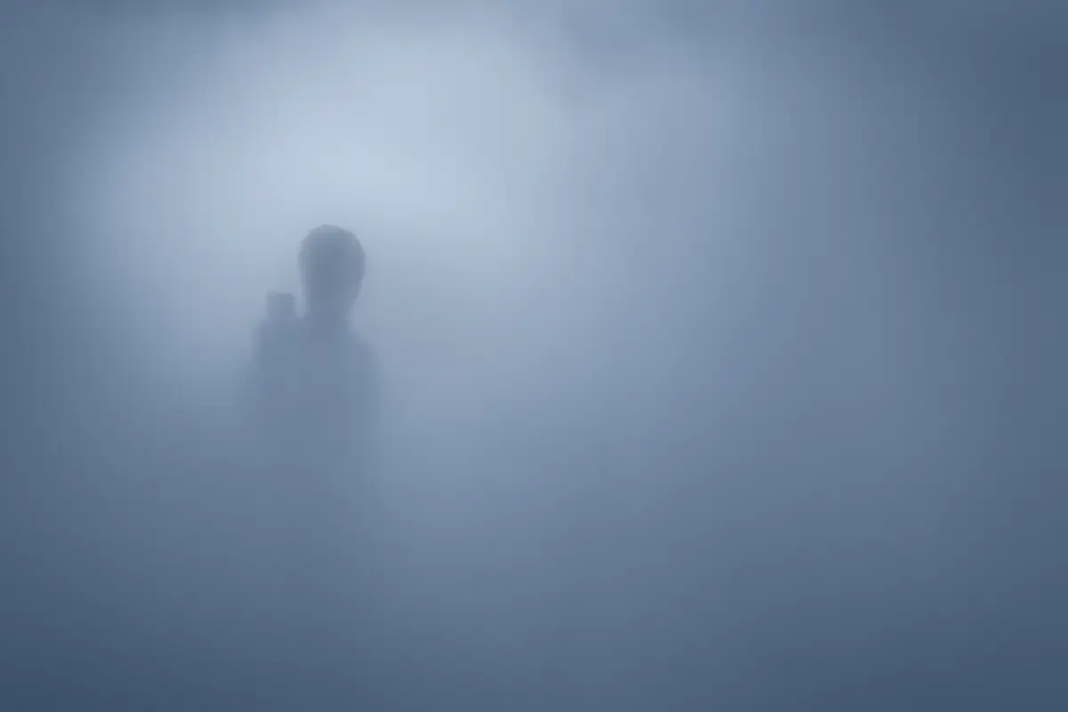 No Signal: Alone in the fog, he stares at his phone. No signal. Nowhere to go.<p>© Kantaya New</p>