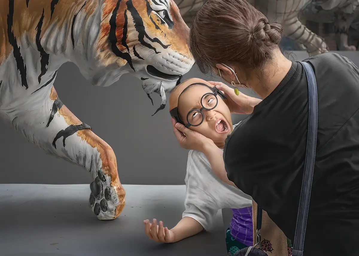 The Prince Who Learned to Scream: Guided by his mom’s hand, the Prince practiced his roar before the tiger.<p>© Kantaya New</p>