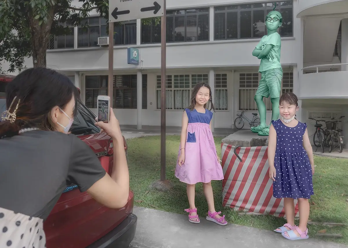 The Prince Who Became a Statue: Painted green and standing still on a box, the Prince said he was bronze today, and waited for his portrait.<p>© Kantaya New</p>