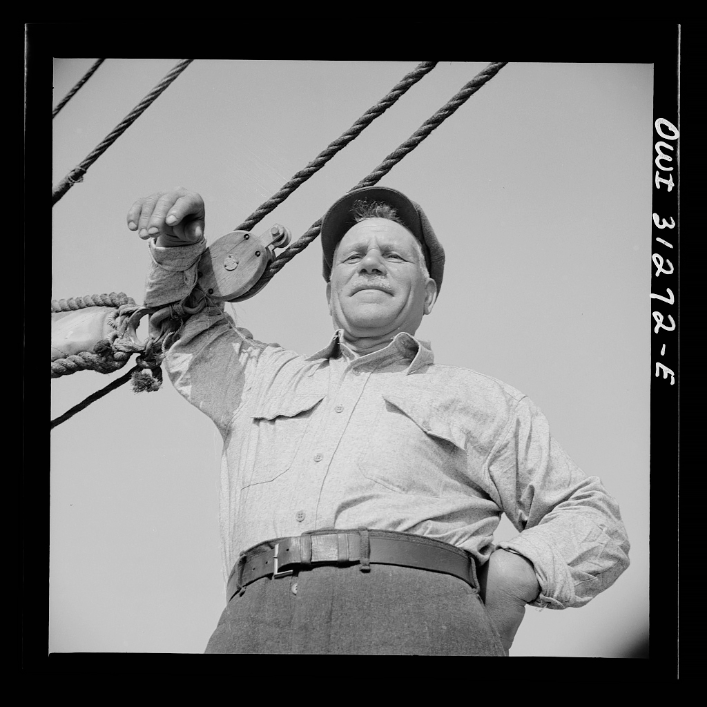 On board the fishing boat Alden out of Gloucester, Massachusetts. Antonio Milietello, the oldest fisherman aboard 1942<p>© Gordon Parks</p>