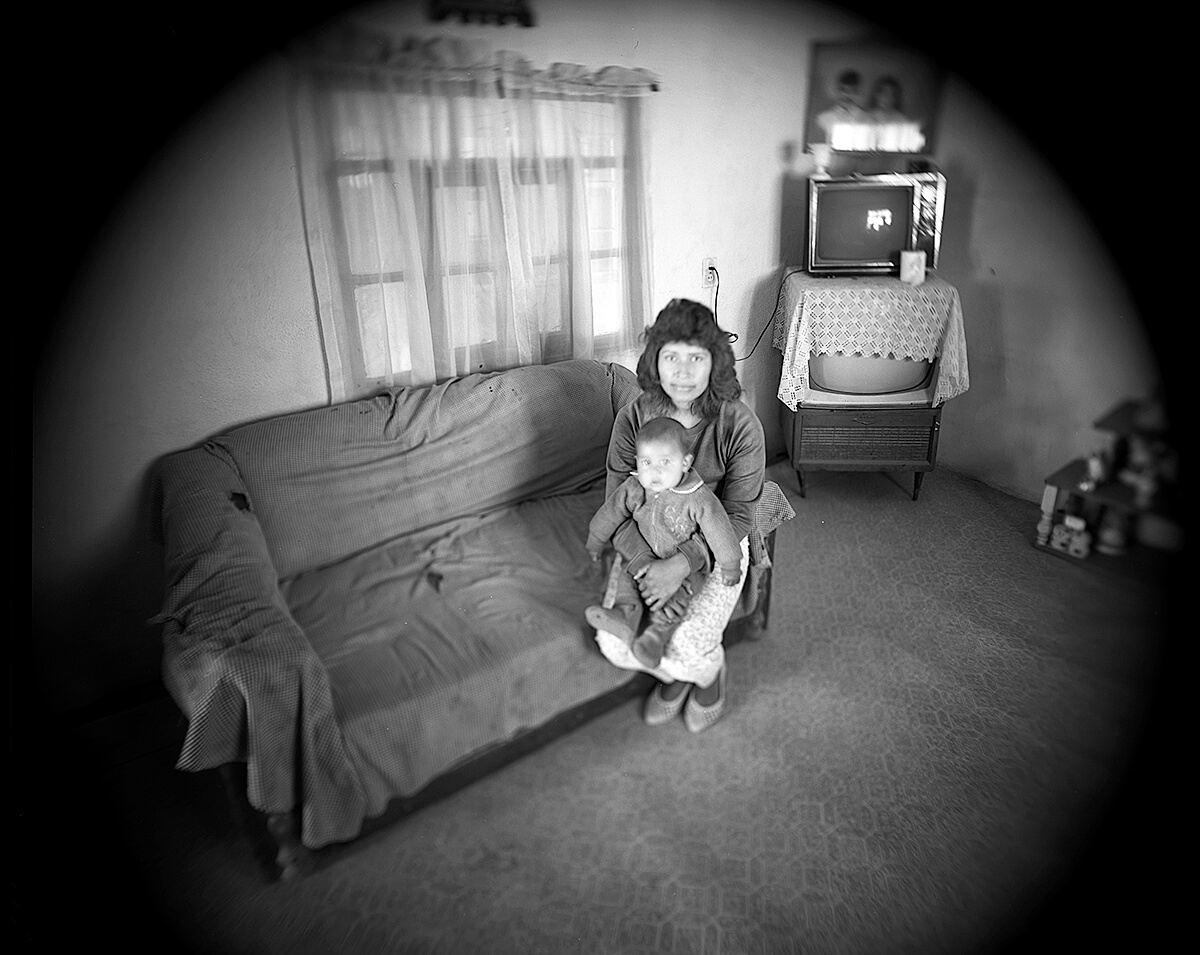 Mother and son in living room<p>© Meg McKenzie Ryan</p>