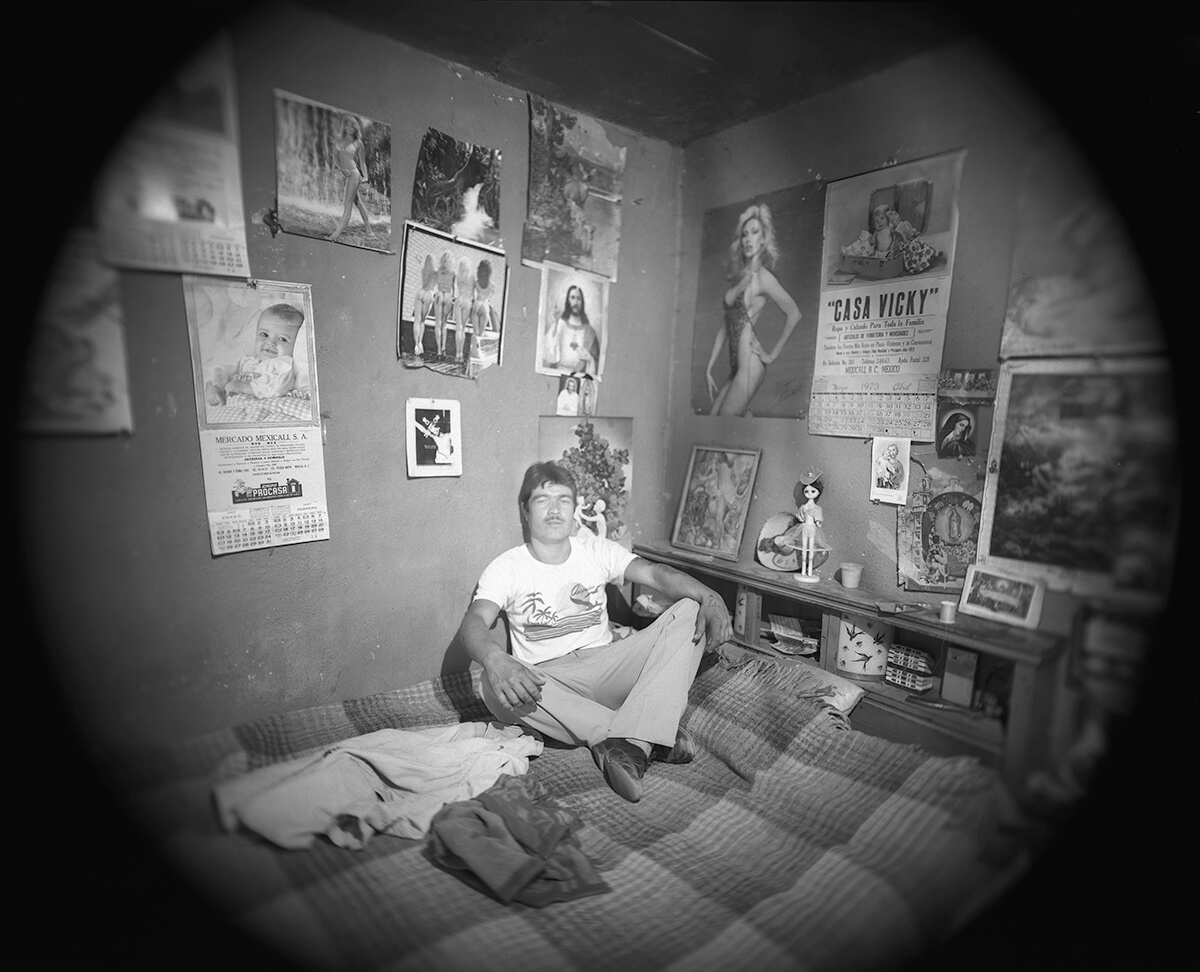Young man in his bedroom<p>© Meg McKenzie Ryan</p>