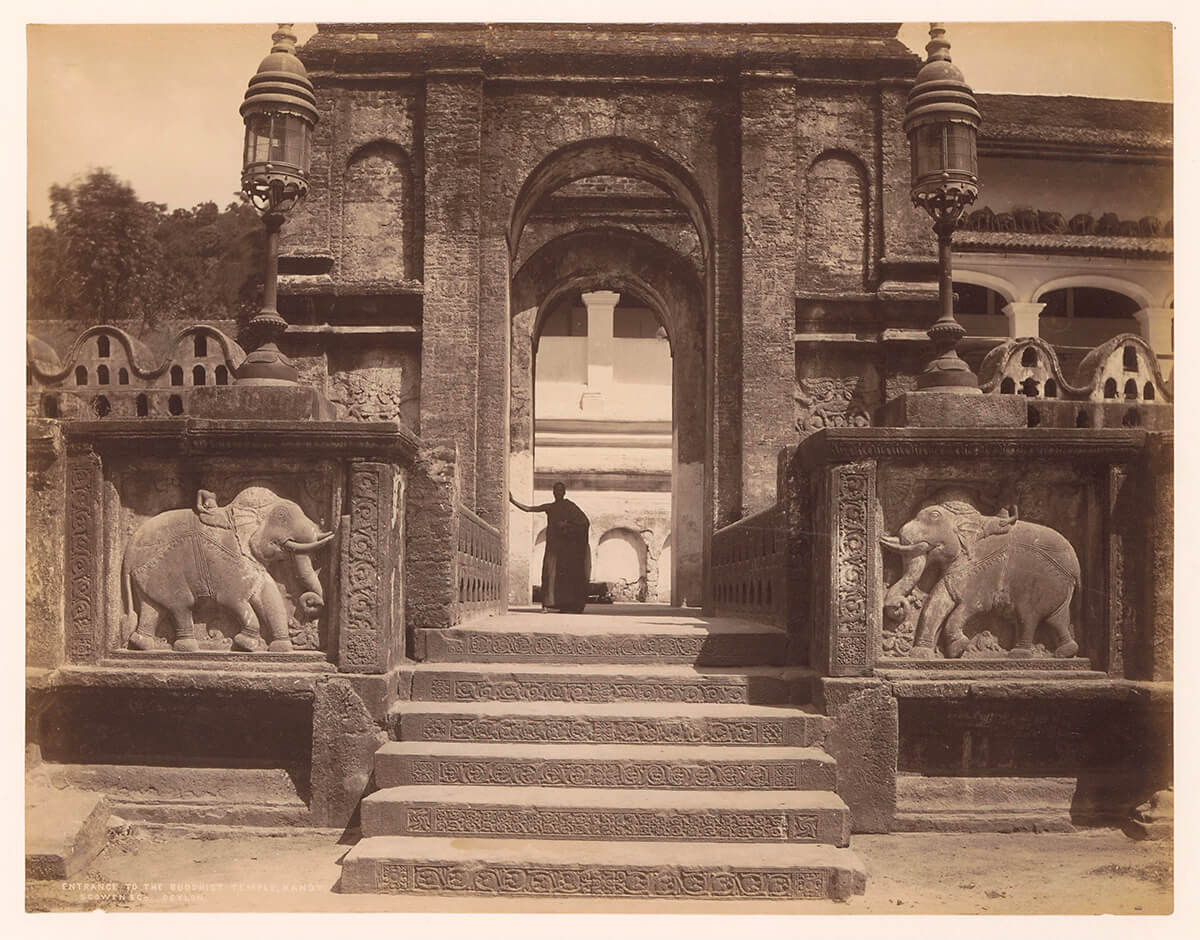 Entrance to the Buddhist temple, Kandy, Ceylon, between 1850 and 1900<p>© Charles Scowen</p>