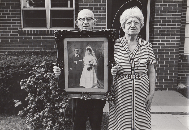 Untitled (Old couple with wedding portrait), c. 1960’s<p>© Ed Sievers</p>