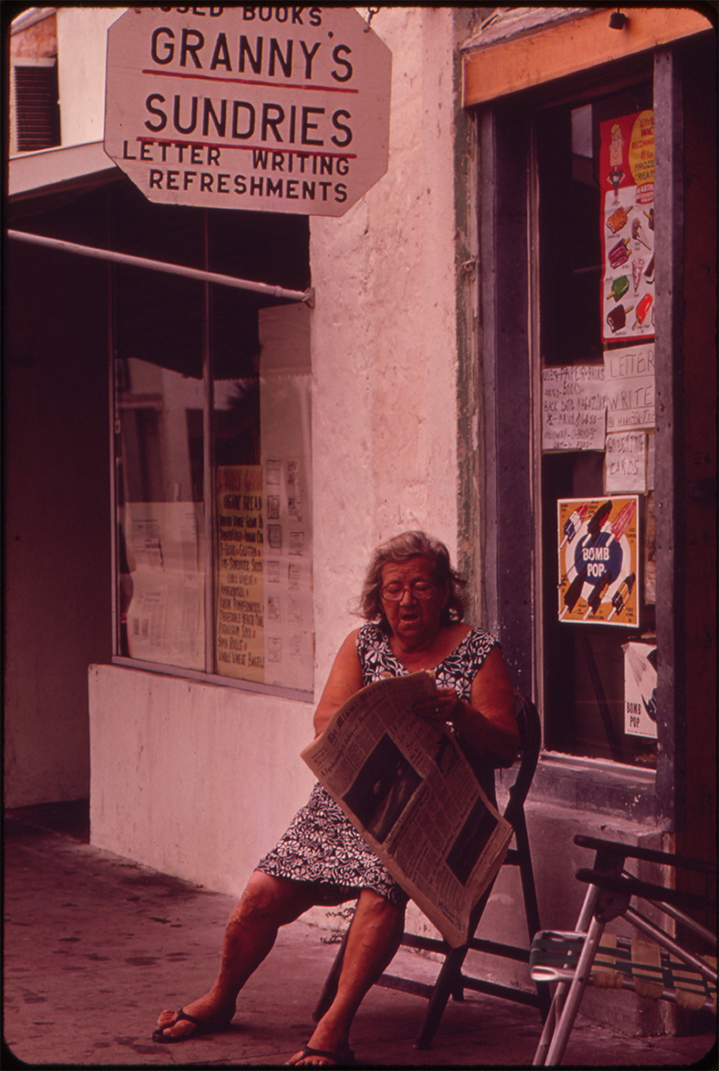 SHOPKEEPER OUTSIDE SMALL STORE WHICH CATERS TO THE OLDER CITIZENS OF THE NEIGHBORHOOD, June 1973 - NARA<p>© Flip Schulke</p>