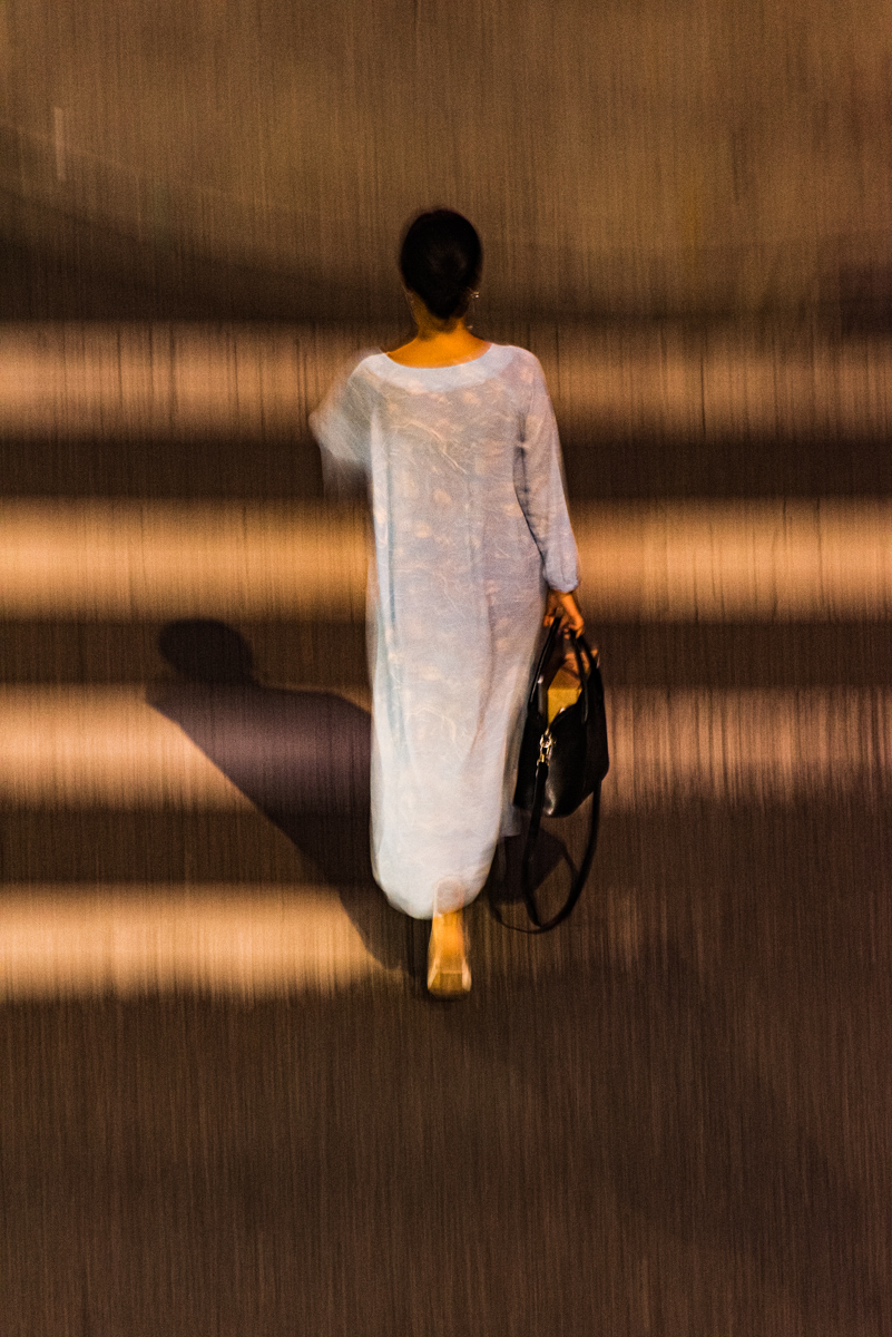 Woman in Blue Dress, 10th Ave., NYC, 2019<p>© Gregory Spaid</p>