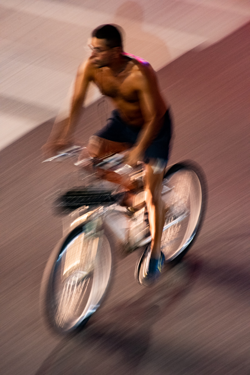 Man Sweating on Bicycle, E. 60th St., NYC, 2022<p>© Gregory Spaid</p>