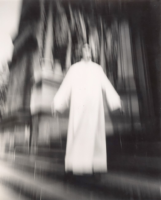 A Priest at St. John the Divine Seems to Be Flying, New York, NY, 1974<p>© Arthur Tress</p>